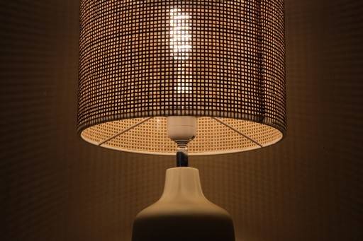Lamp lighting a dark room