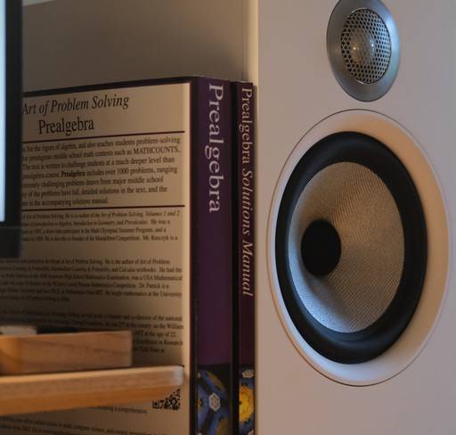 Speaker alongside maths textbooks