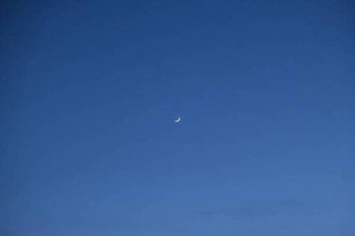 Crescent moon at dusk